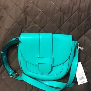 Saddle crossbody